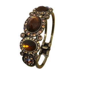 Antique brass tone bejeweled costume dressy statement bracelet hinge clamper.